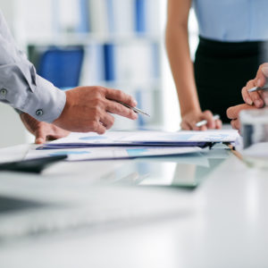 Hands of business people working with documents